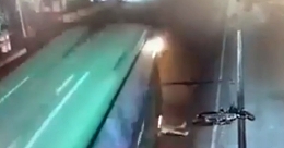 A motorcyclist is crushed by a bus (+ aftermath)