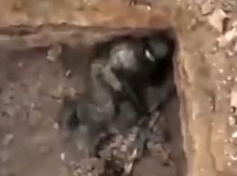 Russian soldier gets hit in a square dugout