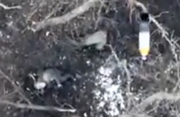 Russian soldiers try to run from a grenade, but...