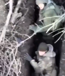 Grenade bounces off the helmet of a RU soldier in a trench