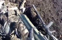 UA troops holding a captured RU position (KIAs visible)