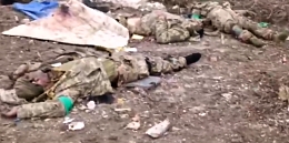 Wagner troops observing multiple UA KIA's in Bakhmut