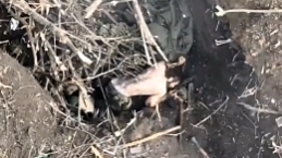 A RU soldier is hit by shrapnel in the back and dies