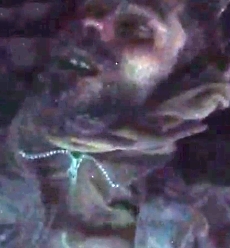 Russian soldier search a KIA Ukrainia