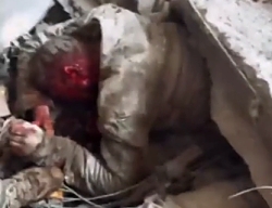 UA soldiers search building for survivors after RU strike