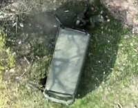 Uaz van and a couple soldiers get bombed by a Ukrainian drone