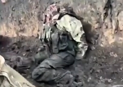 RU KIA in a trench in the east