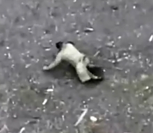 Russian soldier crawls away from explosion in Marynka