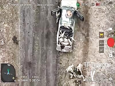 UA soldiers take away dead bodies from the battlefield