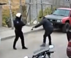 Motorist beats cop