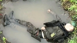 Killed Russian soldiers in and around puddles