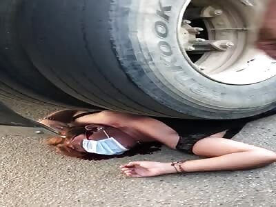 Woman with covid mask crushed under wheels