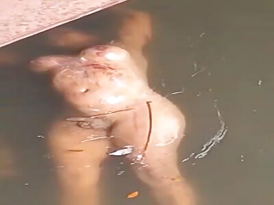 Murdered Tranny Found Floating In River