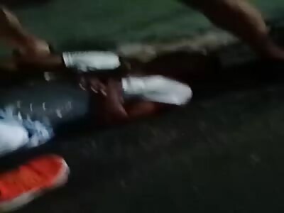 Thief lying brutally trampled on the head