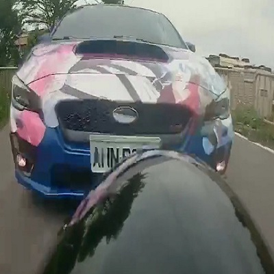 Splat! Biker Bleeds After Head On Collision