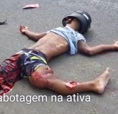 biker was sprawled on the asphalt