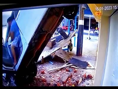 Woman With An Infant In A Stroller Crushed By A Collapsed Roof On Which A Car Had Fallen