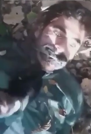 A Captured Enemy Soldier Was Pierced In The Throat With A Knife