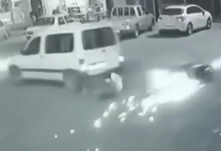 Motorcycle Slides 80 Yards, Crashes Into Car