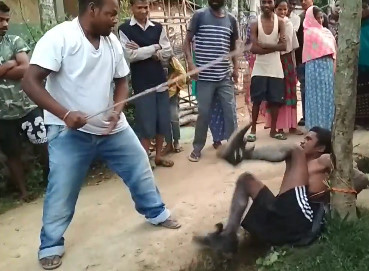 Tied to a Tree and Beaten like a Yelping Dog