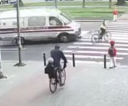 Ambulance Rams Girl on Bicycle