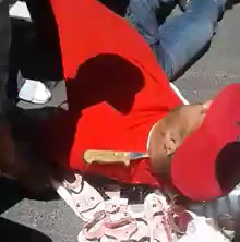 Knife in the Neck for Stealing Shoes