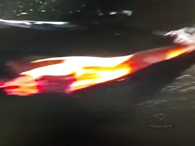 Woman lies dismembered on the asphalt