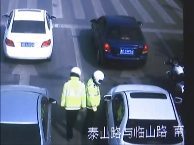 Driver Takes Cop For a Ride