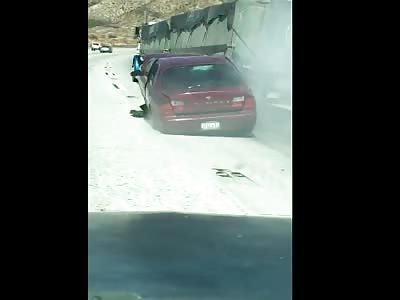 Car Dragged By Trucker
