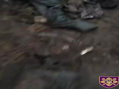 Dead Russian soldiers in a trench ,somewhere in Ukraine.