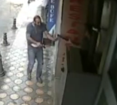 Man Armed With a Handgun is Killed by Another Waiting With a Shotgun