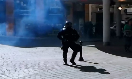 One Lone Police Officer finds Himself All Alone amidst Protesters 
