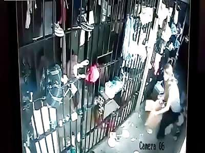 Female Security Guard gets a Little Too Close to the Inmates 