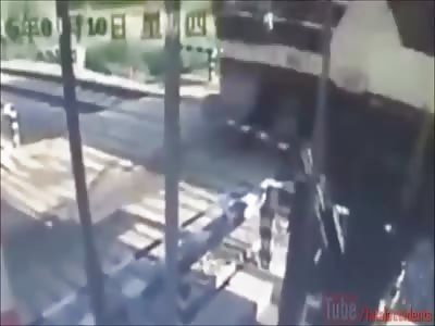 Unlucky Scooter Rider falls Off and is Run Over by Train (Passenger too) 