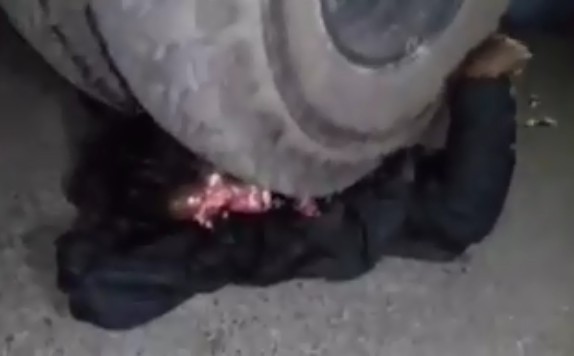 Poor Man Suffering, Still Alive under Truck Tire 