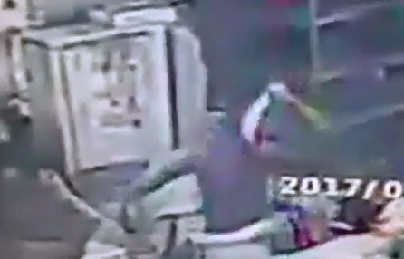 Maniac pulls Machete from his Waist Band and Ferociously Attacks a Female in the Street 