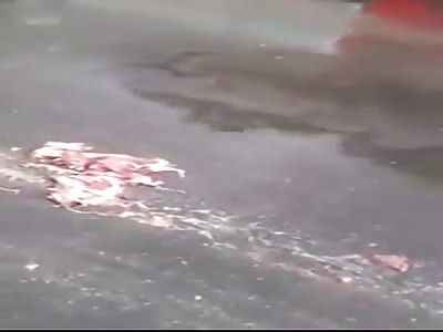 Man Torn to Shreds in the Street te Bottom Half of him is one Somewhere..I don.t Know Where