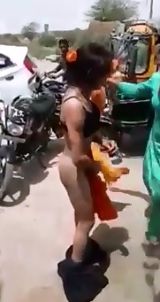 Transvestites Caught Stealing are Stripped by Group of Woman 