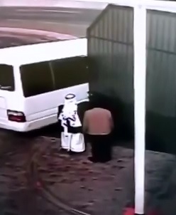 good CCTV - big iron fence crushes man in Saudi Arabia 