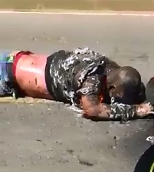 2 Men after Motorcycle Joyride..Burning Alive next to his Bike 