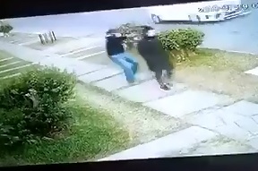 Woman on a Stroll takes Headshot to the Back of the Head 