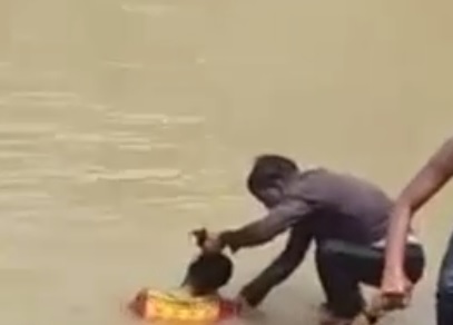 Indian Woman who Cannot Swim Kills Herself by Jumping into a Pond (Includes Aftermath) 