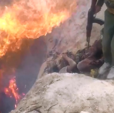 ISIS being Barbequed and Dumped into Dirt Grave 