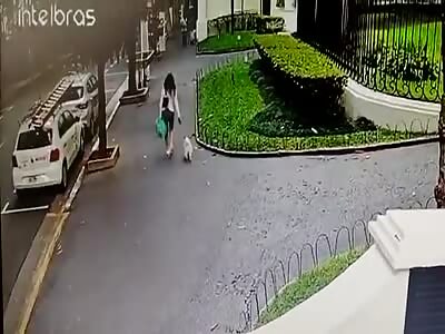 Woman dragged behind thieves motorcycle.