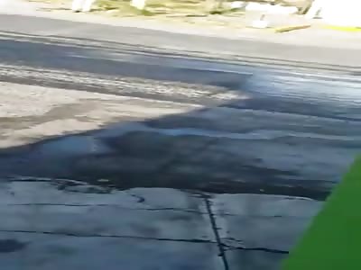 Car on fire with people inside