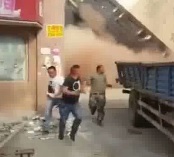 Worker in Excavator Crushed by Falling Building