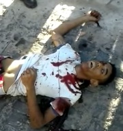 Man in semi-open regime (prisoner) using electronic anklet agonizes