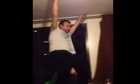 Man dancing over a table falls from apartment window