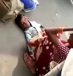 Mother Grieves Over her Dead Son