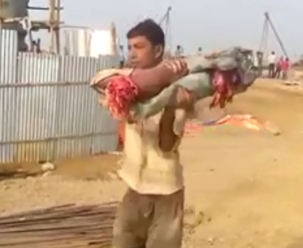 Guy carrying friend's legs while others cries trying to save him